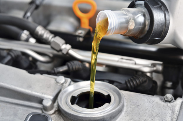 Lubricant oil is poured into an engine